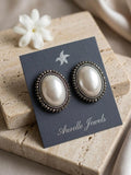 Oval Shaped Pearl Studs With Black Metal Border